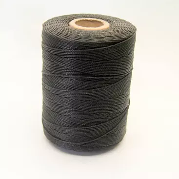 Làm thế nào chỉ khâu bện phẳng có thể giải quyết các nút thắt trong khâu may tại nhà máy giày dép và da?